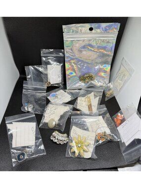 Lot of 12 Stamped,  Mismatched, Costume Jewerly earrings, Brooches,